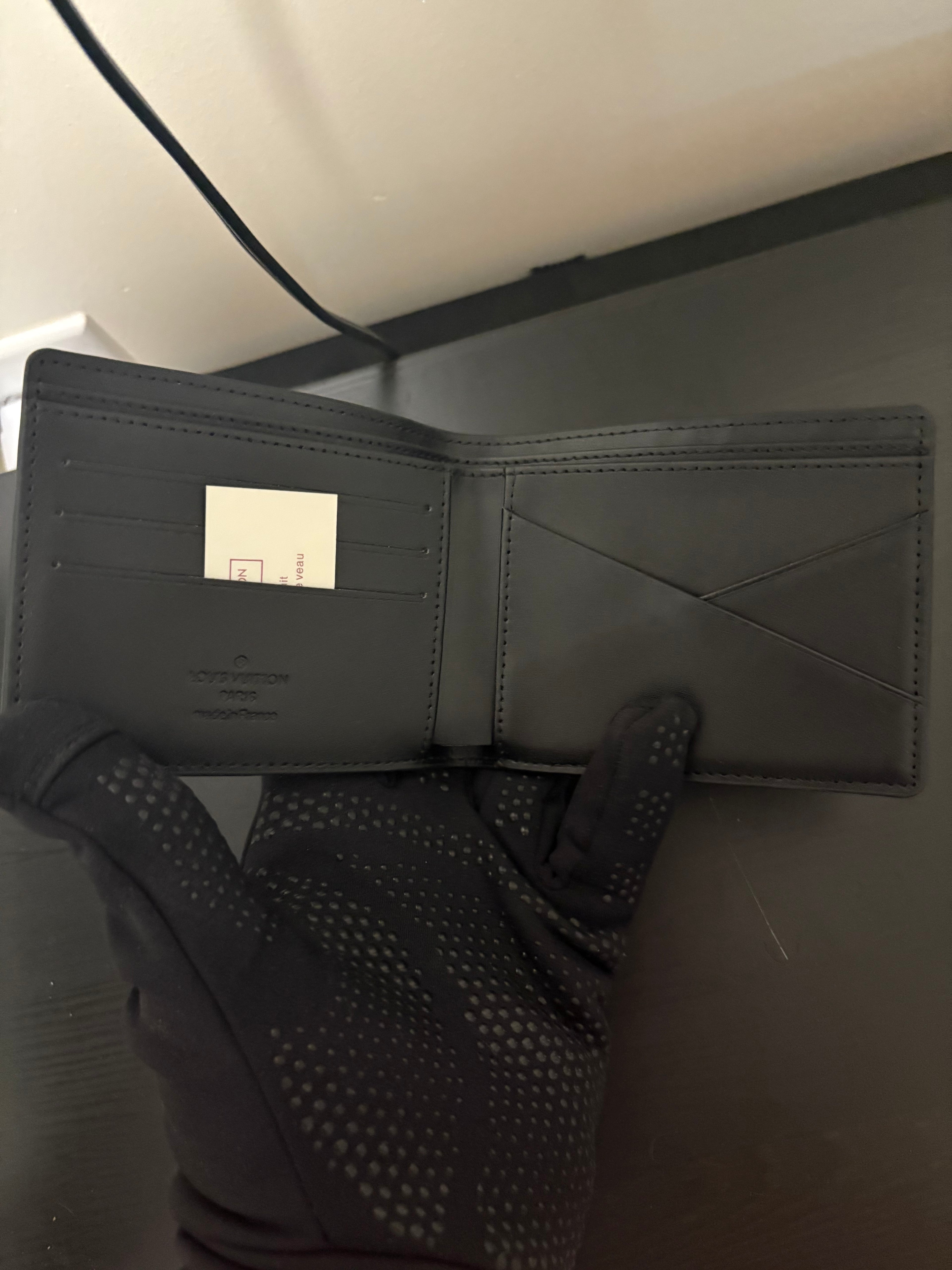 LV embossed checkered pattern wallet black