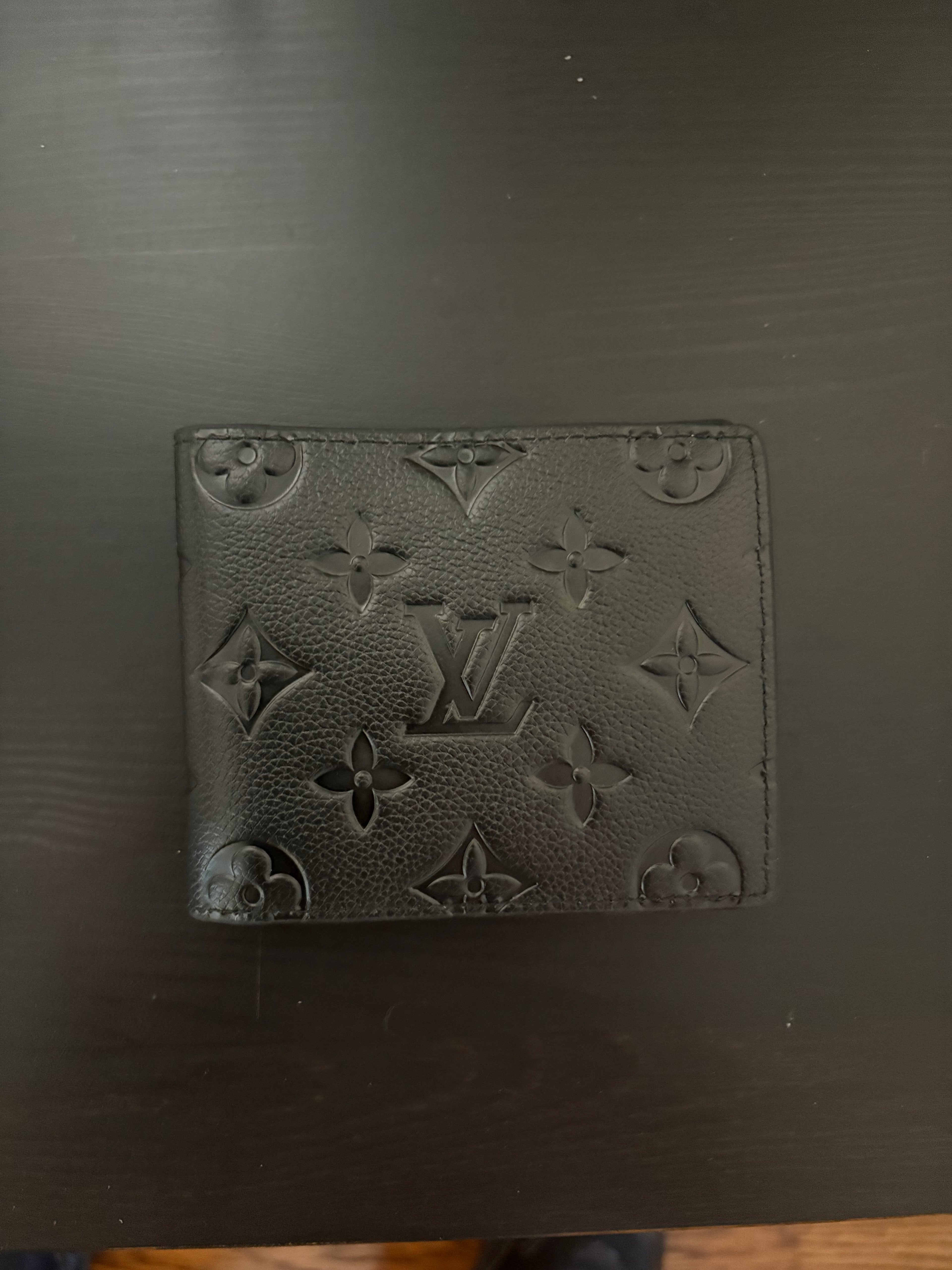 LV embossed leather print wallet black